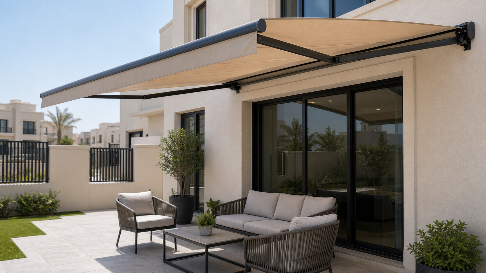 finished retractable awning shading a Dubai townhouse terrace