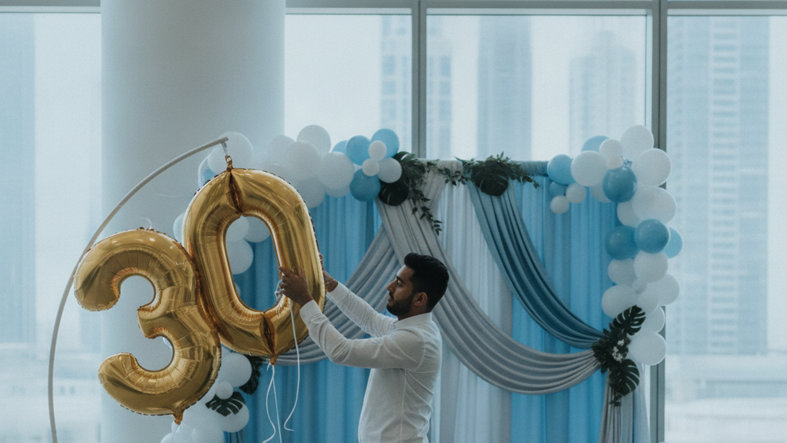decorator installing number balloons for a Dubai birthday party