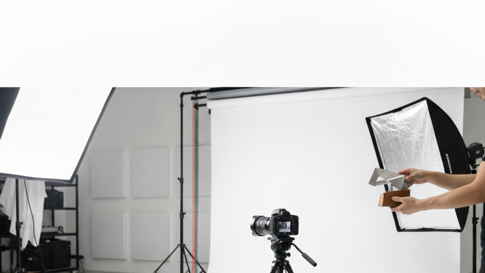 product photographer arranging lighting for Dubai product shoot